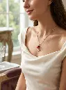 AI Generated Red enamel tulip necklace lifestyle image